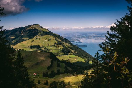 The scenic view from Rigi Scheidegg to the lake before a blue skyline in Switzerland