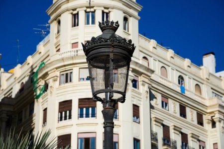 Photo for Old street lamp at Town Hall Square (Plaza del Ayuntamiento). Valencia, Spain - Royalty Free Image