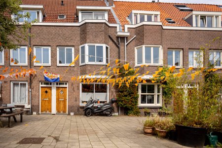 Photo for Residential homes in capital city Amsterdam with exterior facade and typical Dutch style - Royalty Free Image