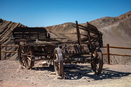 Photo for Remains of an old wooden cart in a town in the far west. Is abandoned - Royalty Free Image