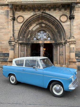 Photo for An old retro car in front of the University of Glasgow - Royalty Free Image