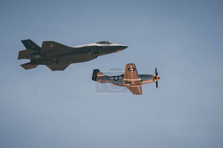 Photo for The F35 and Mustang P-51 in Heritage flight at Hill AFB. Ogden, Utah, USA. - Royalty Free Image
