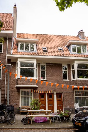Photo for Residential homes in capital city Amsterdam with exterior facade and typical Dutch style - Royalty Free Image