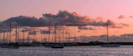 Photo for Scenic purple sky over St Kilda at sunset, Scotland - Royalty Free Image