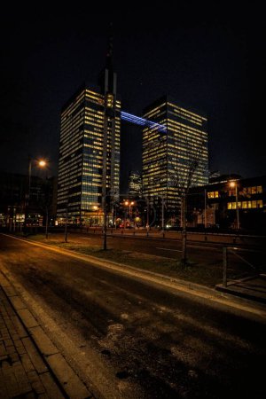 Photo for Vertical night cityscape on the Belgacom Proximus twin towers from the street - Royalty Free Image