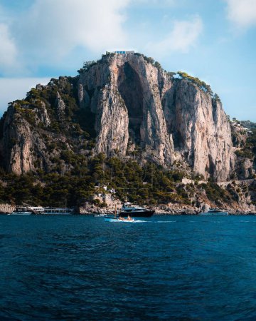 Photo for A vertical shot of the island cliffs of Capri in the Gulf of Naples, Italy - Royalty Free Image