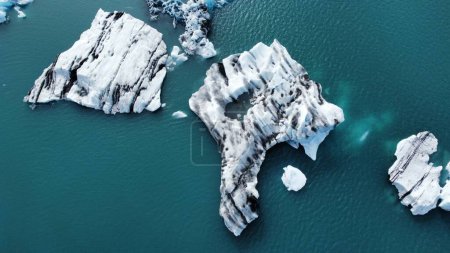 Photo for An aerial view of icebergs in the majestic turquoise sea in Iceland - Royalty Free Image