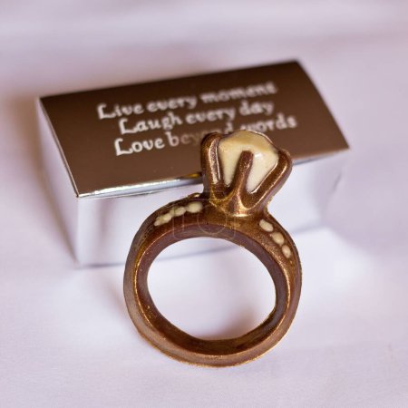 Photo for A closeup of chocolate ring in background of quote - Royalty Free Image