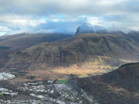 Photo for An aerial shot of the town of Fort William before Mount Ben Nevis in Scotland - Royalty Free Image