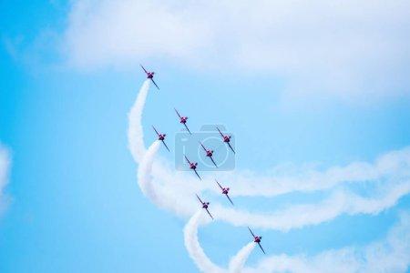 Photo for The Red Arrow Aerobatic Team in the RIAT airshow in Fairford, England, UK - Royalty Free Image