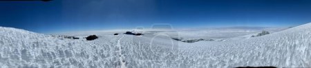 Photo for A panoramic view of a glacier on the Uhuru peak in Mount Kilimanjaro under a clear blue sky - Royalty Free Image