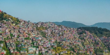 Photo for The blue sky over Shimla Himachal Pradesh Mountains, trees, and buildings - Royalty Free Image