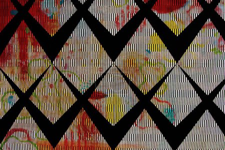 Ein abstrakter, bunter Hintergrund mit schwarzen geometrischen Mustern