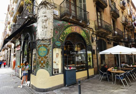Photo for The Antigua Casa Figueres cafe with people in the foreground in Barcelona, Spain - Royalty Free Image