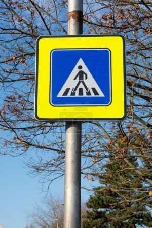 Photo for A closeup view of pedestrian crossing road sign - Royalty Free Image