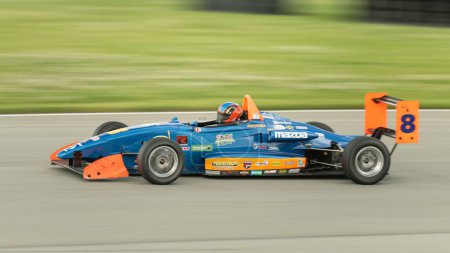 Photo for A competing racecar at the F1 Series Racing at Pitt Race in Beaver Falls - Royalty Free Image