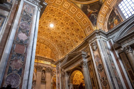 Photo for The interior of Saint Peter's Basilica with patterns and paintings on the walls - Royalty Free Image