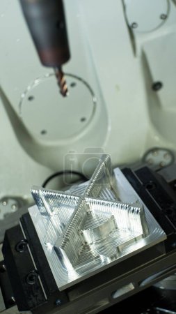 Photo for A closeup of a CNC milled part in the process - Royalty Free Image