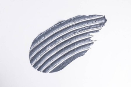 Foto de Una muestra de textura de arcilla de carbón sobre fondo blanco - Imagen libre de derechos