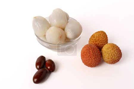 Photo for Whole fresh lychees, peeled and with their bones on a white background - Royalty Free Image
