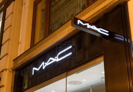 Photo for A low angle night shot of the MAC cosmetics logo in front of their store in Budapest - Royalty Free Image