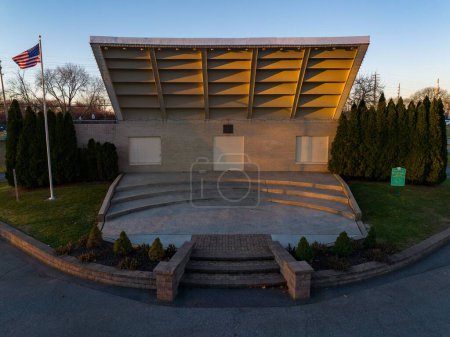 Photo for An empty concrete bandstand in a park at sunrise - Royalty Free Image