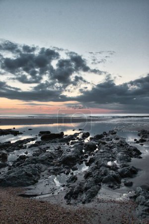 Photo for Scenic view of Whitecliff bay at sunset, UK - Royalty Free Image