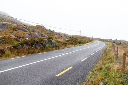 Photo for The Ring of Kerry road under a cloudy sky in Ireland - Royalty Free Image