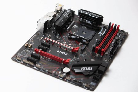 Photo for A Closeup of MSI in a computer motherboard isolated on a white background - Royalty Free Image