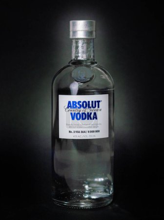 Photo for A vertical shot of a Limited edition Absolut Vodka bottle placed in front of a black background - Royalty Free Image