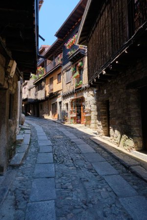 Photo for A vertical of the narrow cobbled streets of La Alberca, a small town in Spain - Royalty Free Image