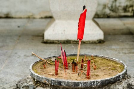 Photo for A closeup shot of incense sticks at the buddhist temple - Royalty Free Image