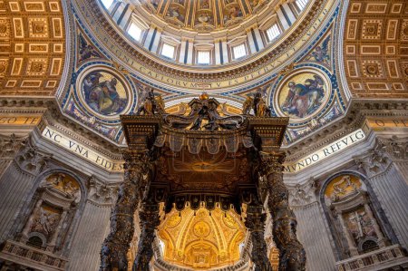 Photo for A low angle shot of the interior of Saint Peter's Basilica and Saint Peter's Baldachin - Royalty Free Image
