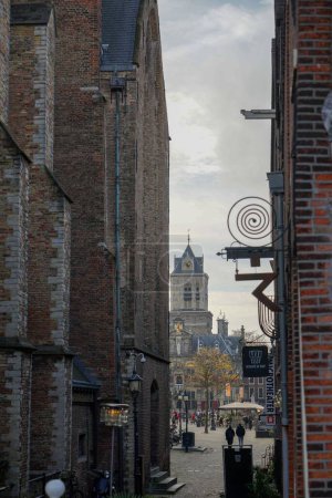 Photo for The city center of Delft in Netherlands between the old church and other buildings - Royalty Free Image