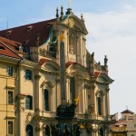 A vertical shot of the Church of Saint Nicholas in Prague, Czech Republic