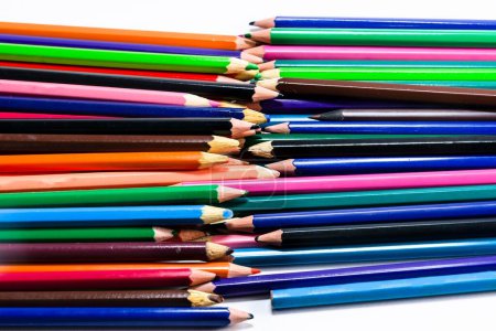 Photo for A closeup of colorful wooden pencils isolated on white background - Royalty Free Image
