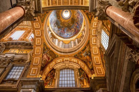 Photo for The interior of Saint Peter's Basilica with a painted dome and marble pillars - Royalty Free Image