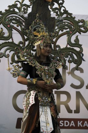 Photo for A model in a Carnaval costume during Indonesia's independence day fashion show in Jepara - Royalty Free Image