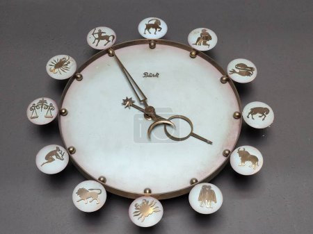 Photo for A closeup of a wall clock with zodiac signs - Royalty Free Image