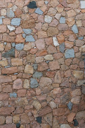 Téléchargez les photos : Un vieux mur de pierre dans une ancienne ville - en image libre de droit