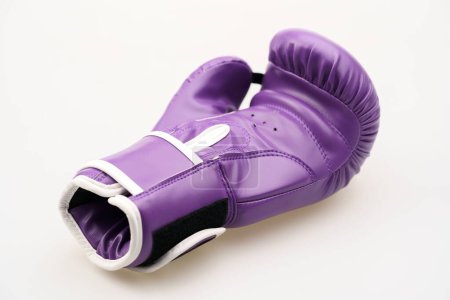 Photo for A single purple boxing glove isolated on a white background - Royalty Free Image
