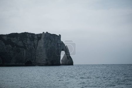 Photo for A breathtaking view of the cliff and people walking in Normandy, France - Royalty Free Image