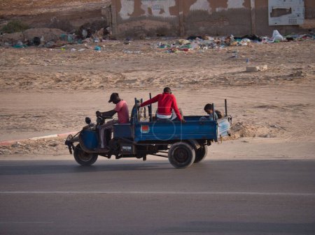 Photo for The People being carried on three-wheelers in the streets of Nouakchott, Mauritania - Royalty Free Image