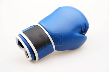 Photo for A single blue boxing glove isolated on a white background - Royalty Free Image