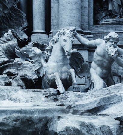 Photo for The Cherub and winged water horse statues emerging from the Trevi Fountain in Rome, Italy - Royalty Free Image