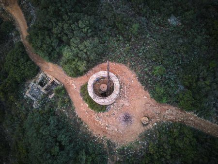 Photo for An aerial view of Torre de Vallferosa surrounded by trees, in Spain - Royalty Free Image