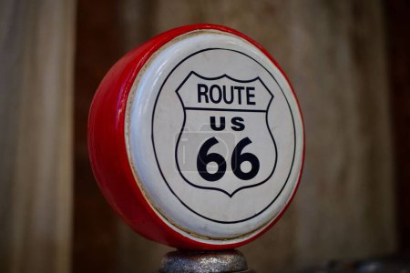 Photo for A closeup of a round "Route 66" sign - Royalty Free Image