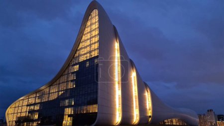 A Famous Heydar Aliyev Center designed by Zaha Hadid on a rainy evening