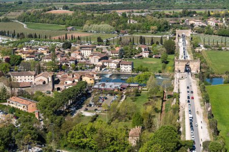 Photo for Aerial view of Borghetto sul Mincio, hamlet of Valleggio sul Mincio and one of the most beautiful villages in Italy, Veneto region - Royalty Free Image