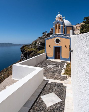 Photo for A picturesque church in Fira overlooking the Aegean Sea, Santorini, Greece - Royalty Free Image
